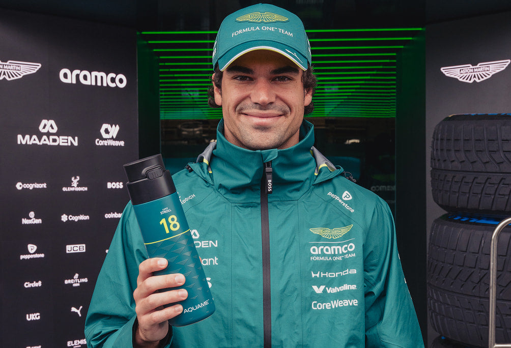 Lance Stroll with AQUAME Aston Martin licensed bottle